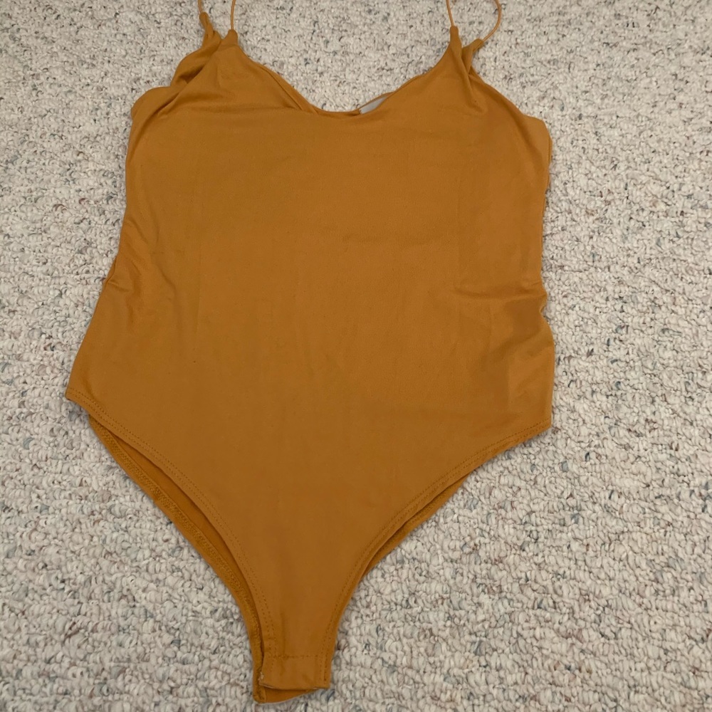Mustard yellow body suit